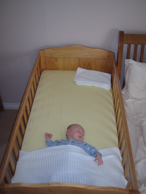 Edward in his cot