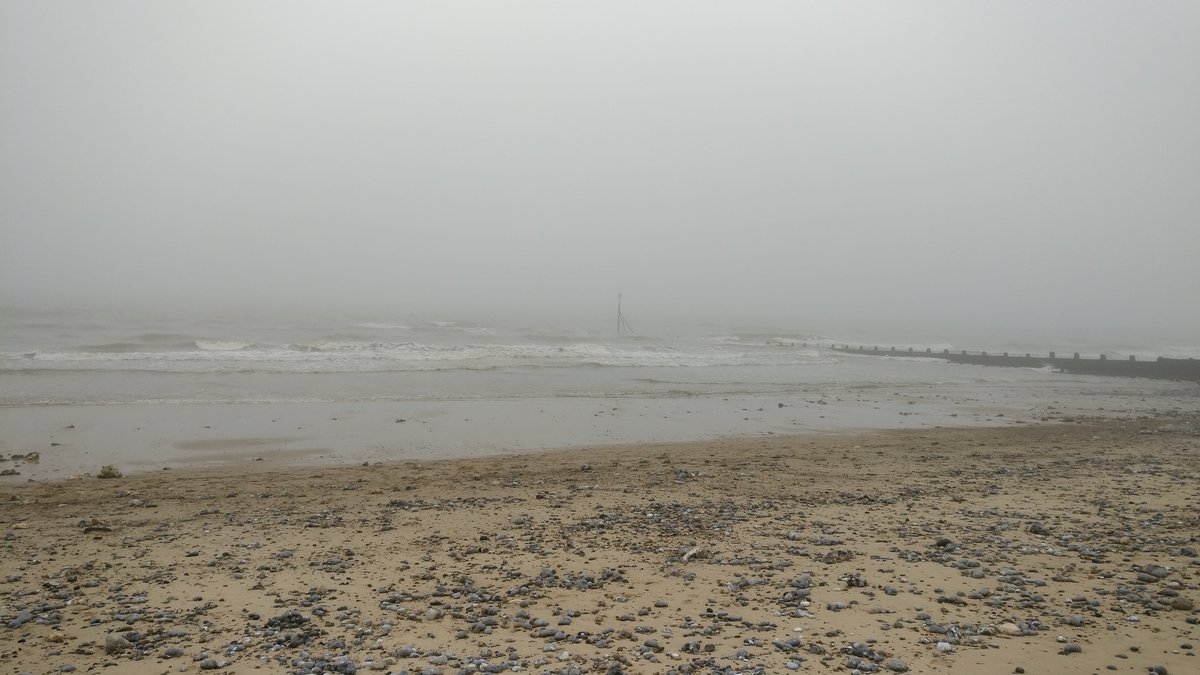 Cromer beach mist out to sea