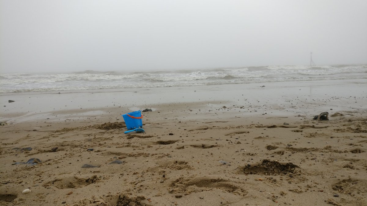Cromer beach with bucket