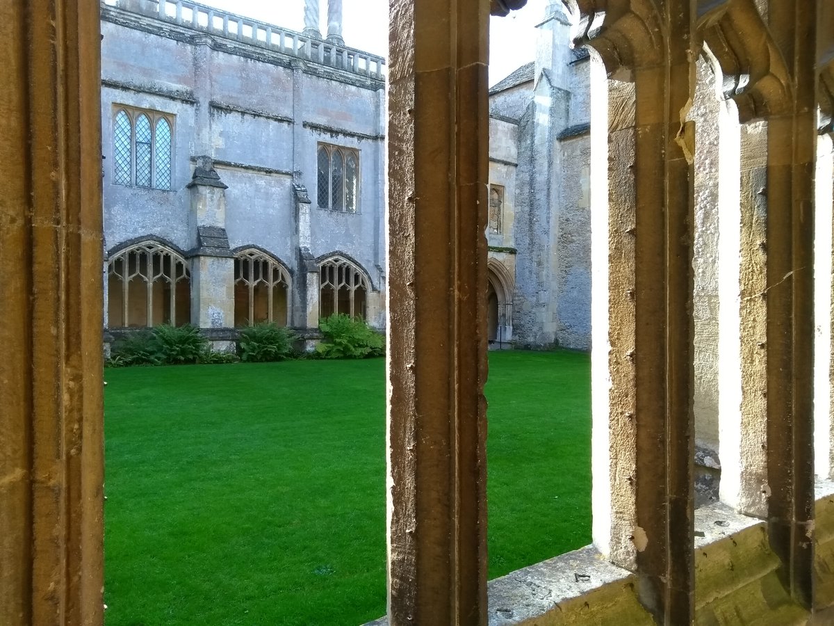 View through stone windows at Lacock Abbey