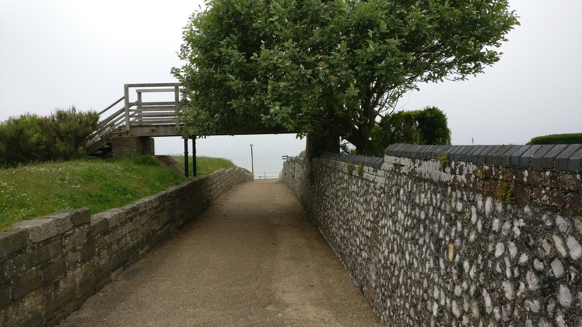 Overcast walkway to the sea