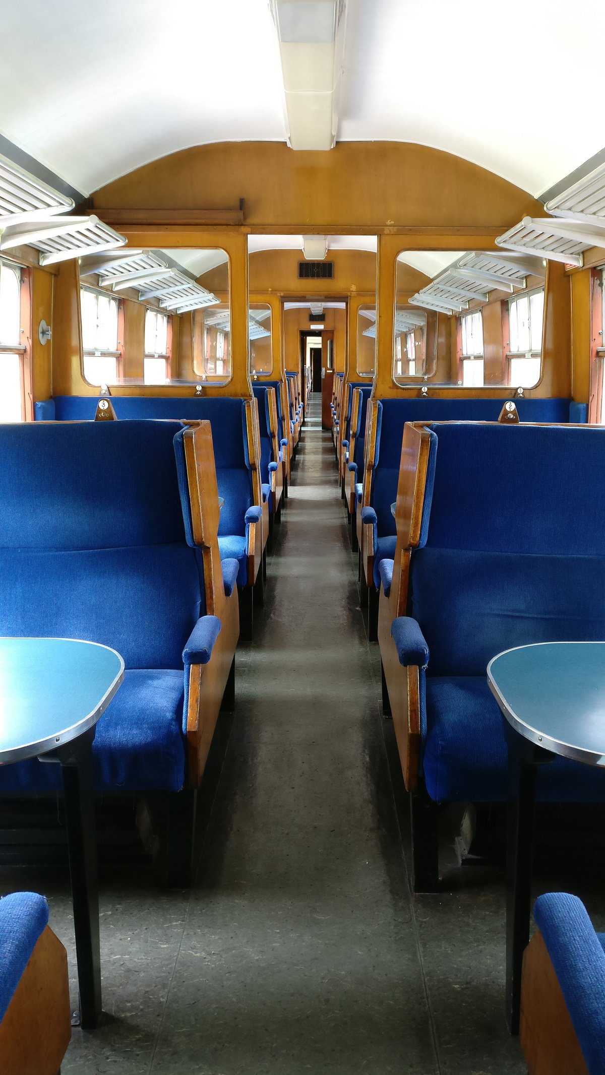 Inside old, open train carriage